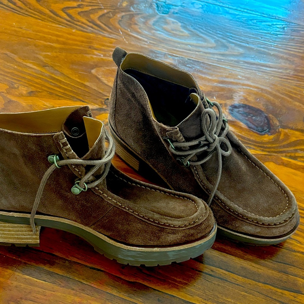 New, without tag, Kork Ease ladies lace up moccasin like boots.